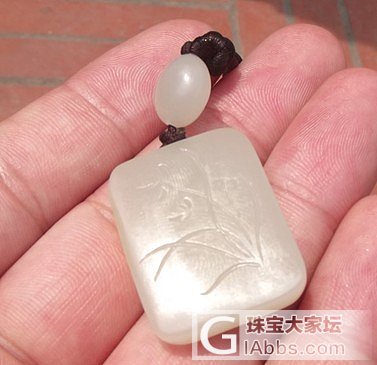 新疆和田玉籽料 兰花牌_传统玉石