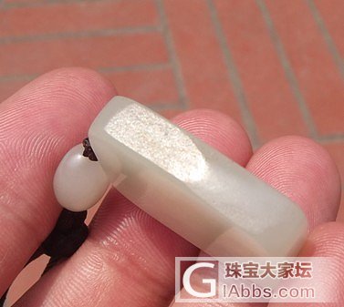 新疆和田玉籽料 兰花牌_传统玉石