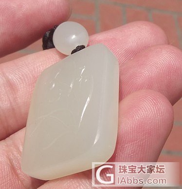 新疆和田玉籽料 兰花牌_传统玉石