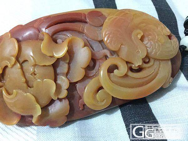 求估价鉴定这个黄龙玉手把件多少钱_黄龙玉