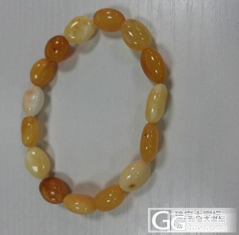 蜜蜡手串，我自己看着喜欢就买了1000元，大家帮忙看看值不值？_有机宝石