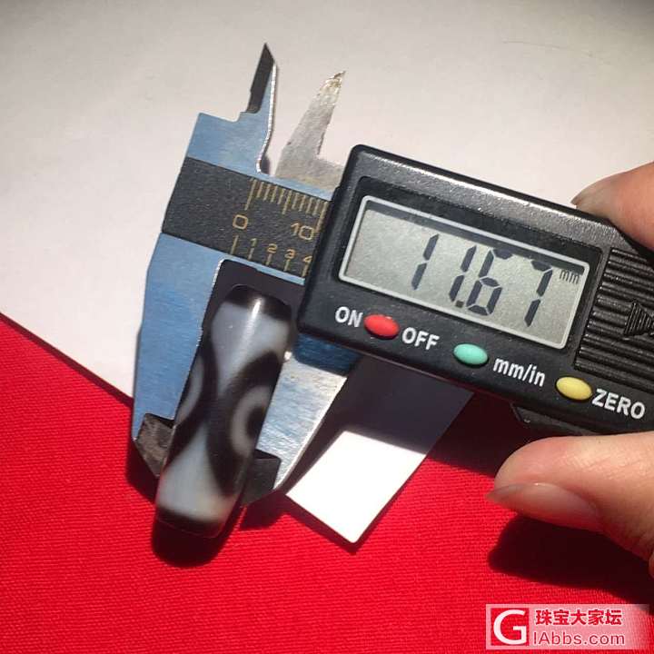 自玩三眼天珠一枚_天珠
