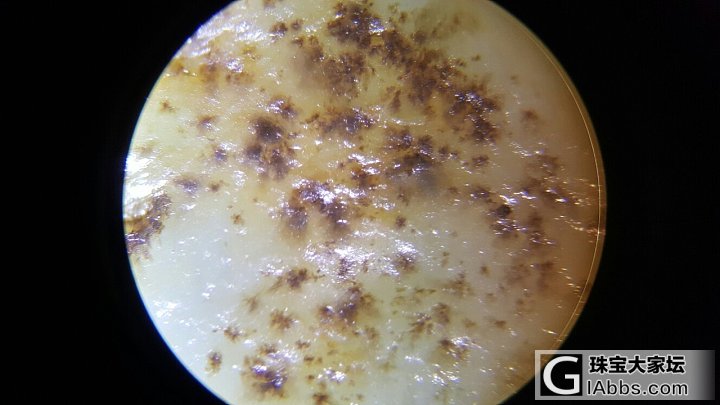 和田玉放大一百倍后求鉴定 是否新疆料和皮籽天然_和田玉