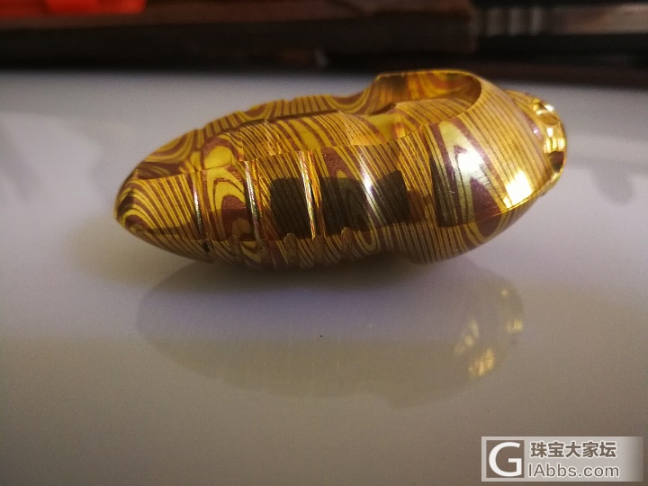 木纹金鬼眼蚕蛹推蛋_金工铜玩