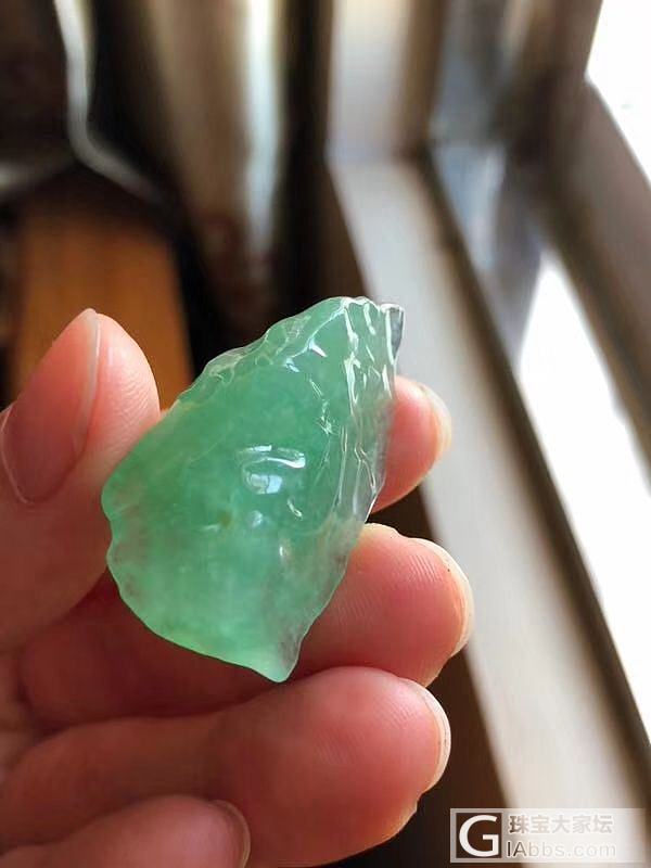 请问这种翡翠料子表面坑坑洼洼是怎么回事？_花件翡翠