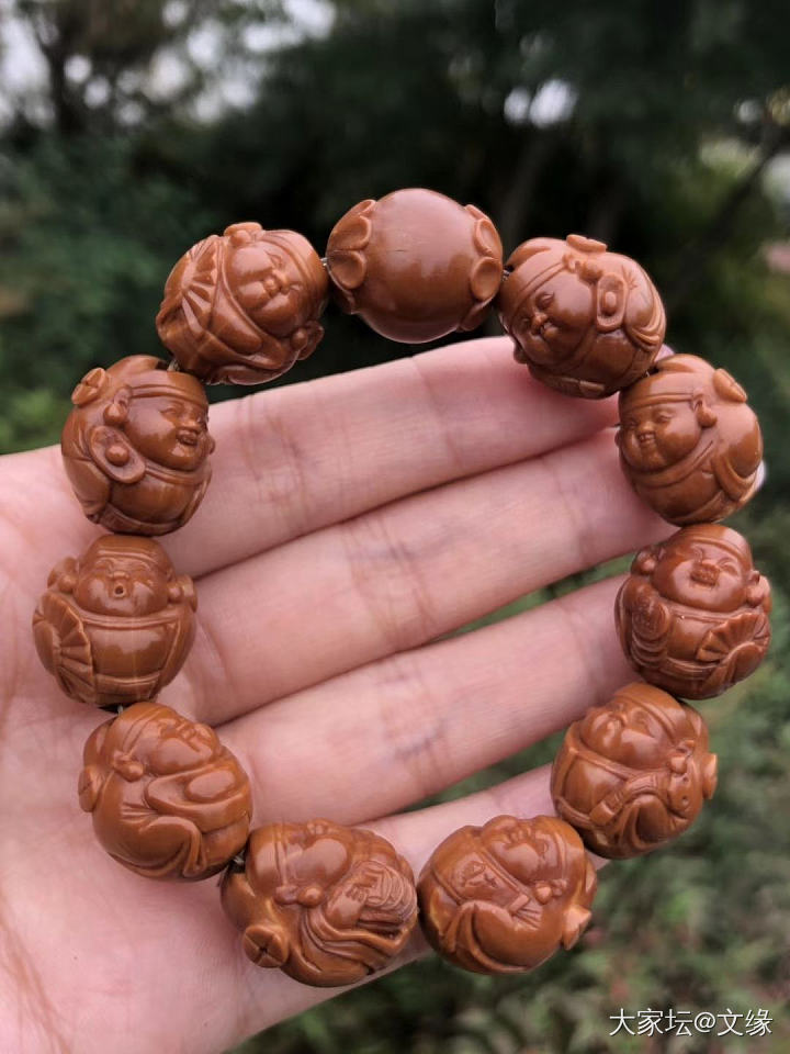 出来遛遛_橄榄核珠串