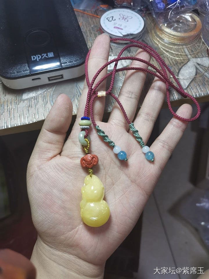 编好了四个坠子_编绳