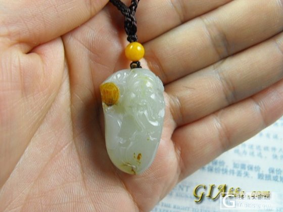 和田玉籽料的白玉财神一个_玉石