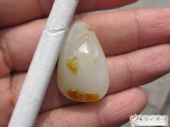 处理了 和田玉白籽料一路如意_玉石