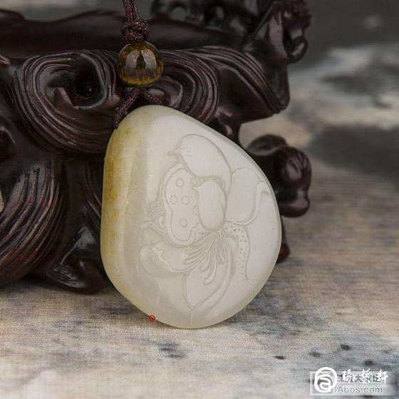 黄皮籽料小荷花_和田玉