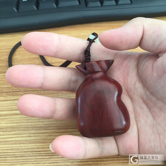 去年入手的一枚小叶紫檀钱袋_小叶紫檀