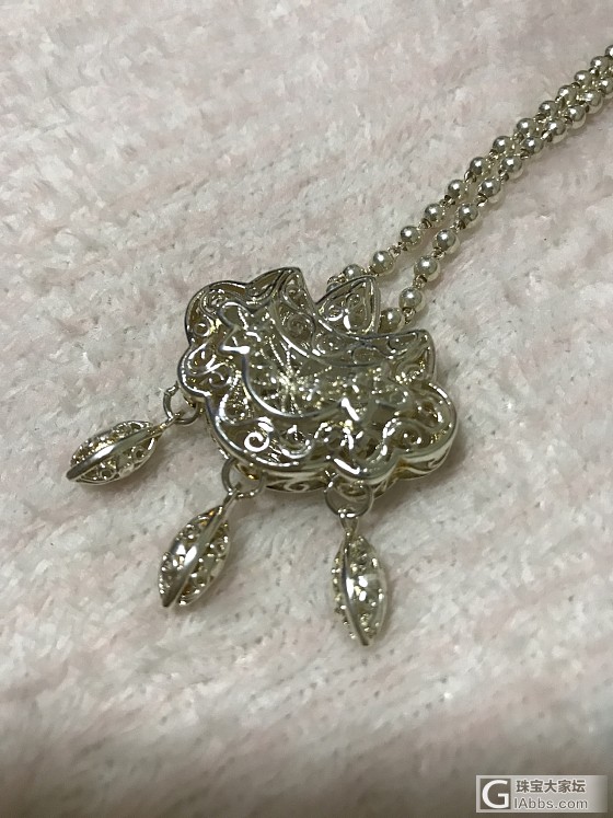 银锁买了一个月，露出金属色_银