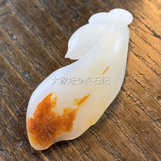 秀一个籽料的荷花_和田玉