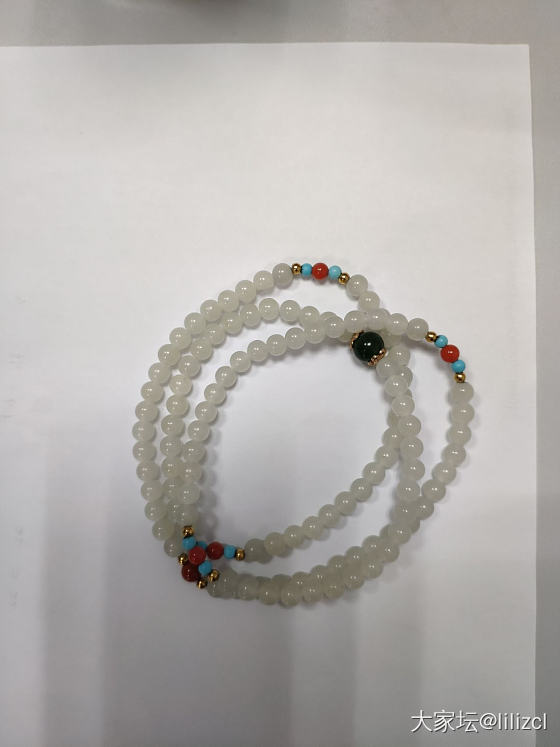 大家帮我看看是不是籽料啊，品质怎么样_珠串和田玉