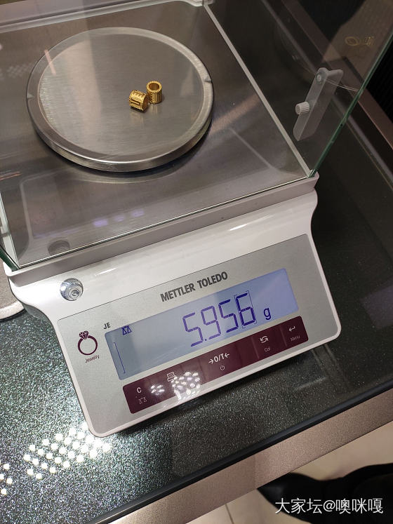 菜百真的可以去当砝码给金店校称_金