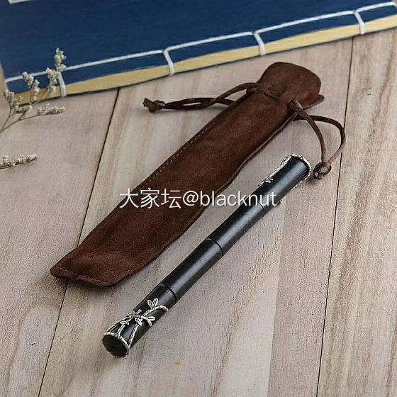 热乎的檀木镶银笔_文玩