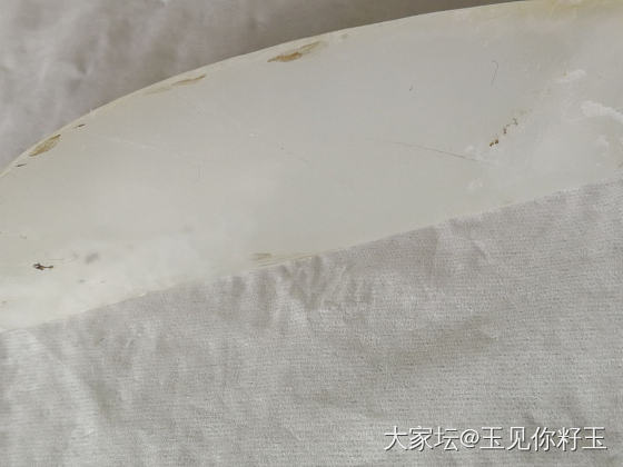 白细的籽料，细度过灯了_和田玉