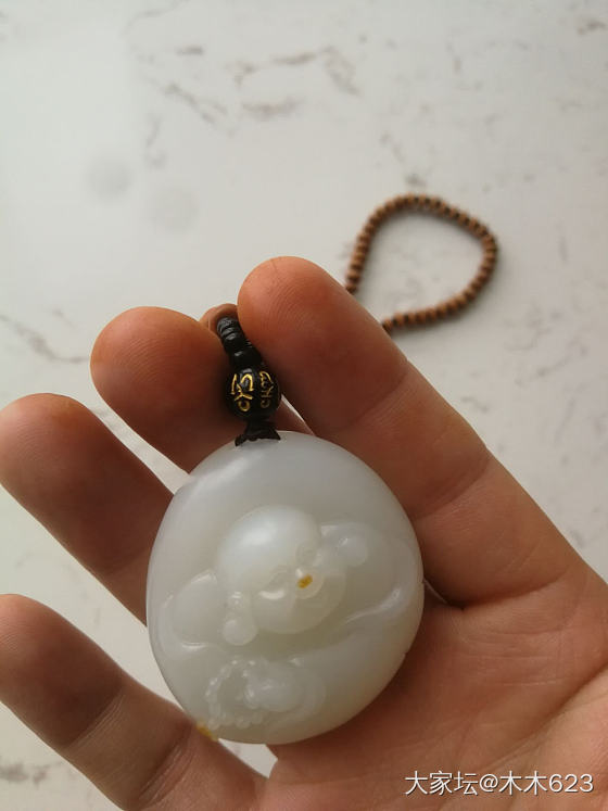 这品质如何？价值过万吗，七十克_和田玉