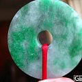 大家帮看看这平安扣真货还是假货，价值多少？