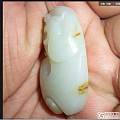 麻煩看看這個是否是和田籽料 有人說是 青海的