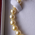 合理利用资源,新增物品=&gt;金色海水珍珠项链+925银琥珀吊坠