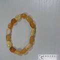 蜜蜡手串，我很喜欢，请帮忙看看是真的假的？