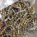请大侠们帮忙看看，这些“红玉髓”有没有染色、高温？