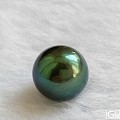 入手一颗12.2mm大溪地黑珍珠，极品孔雀绿。