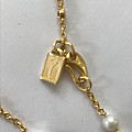Just Gold 珍珠长项链，戴了没几次，断了。24K金细项链不能买。