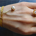 金花丝的珍珠戒指，手镯 很传统又很现代的感觉