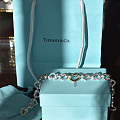 一条蒂凡尼Tiffany and Co的银心套金心手链