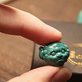 唐狮。绿松石雕刻