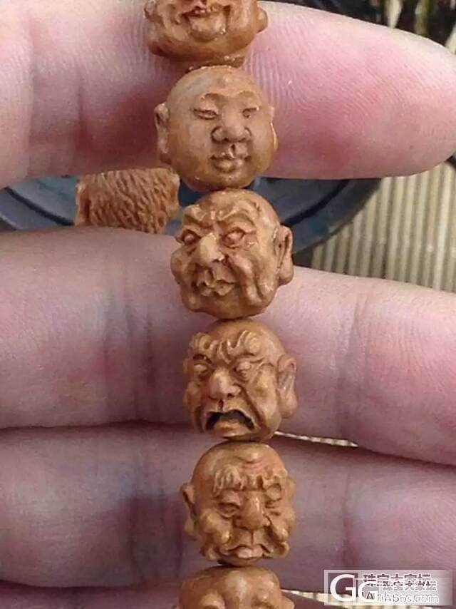 琥珀、蜜蜡,名家雕刻龙纹桃核十八罗汉_有机宝石