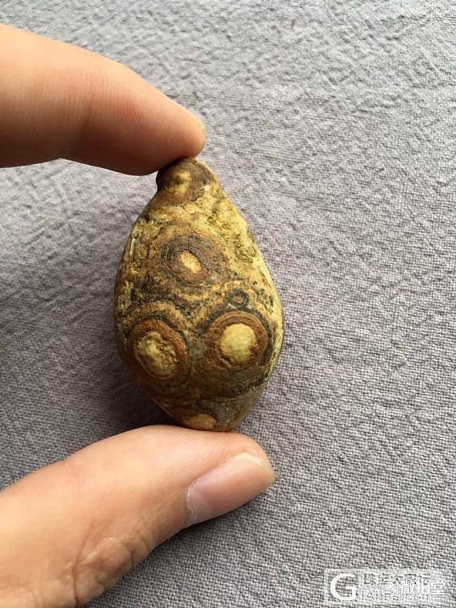 天然金钱石九眼天珠寻结缘_玛瑙观赏石