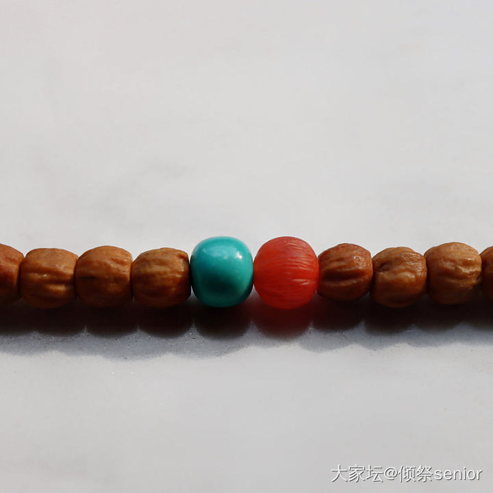 两串正在努力盘的百香籽_文玩