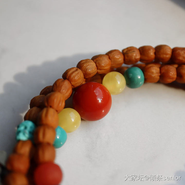 两串正在努力盘的百香籽_文玩