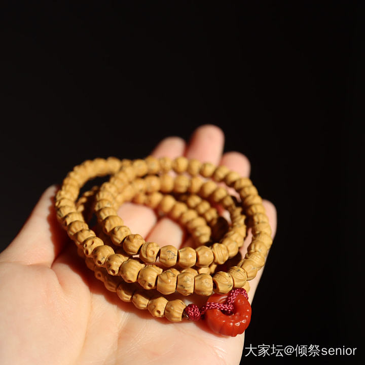 两串正在努力盘的百香籽_文玩