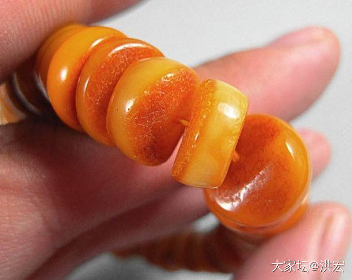 西亚蜜蜡手串带皮问题探讨