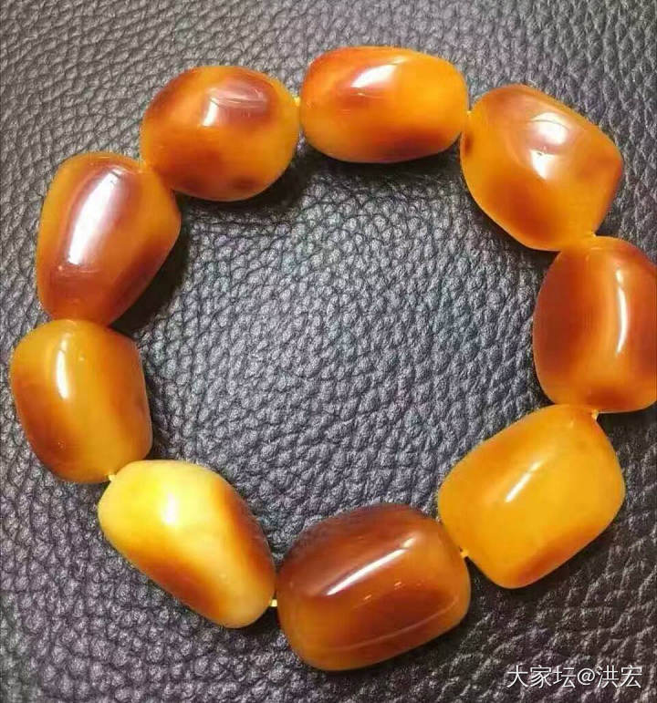 西亚蜜蜡手串带皮问题探讨