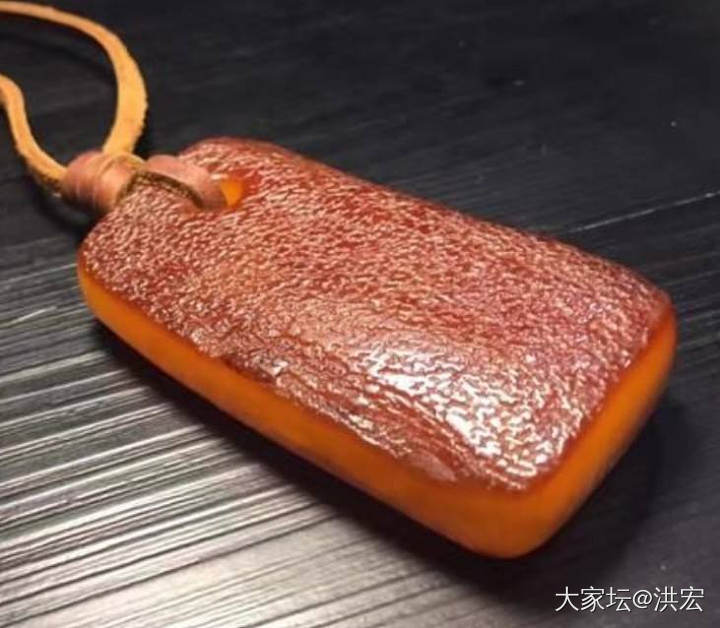 西亚蜜蜡手串带皮问题探讨