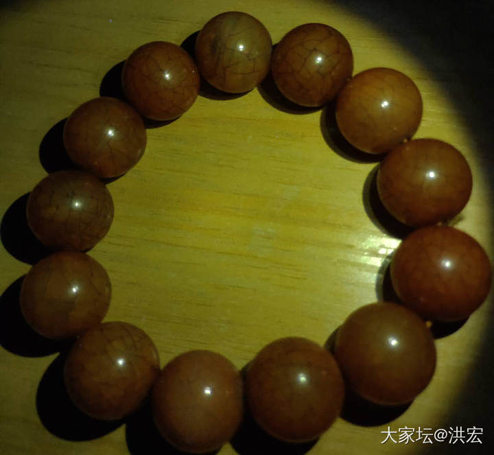 西亚蜜蜡之雪山蜜蜡暨金沙现象在鉴定中运用