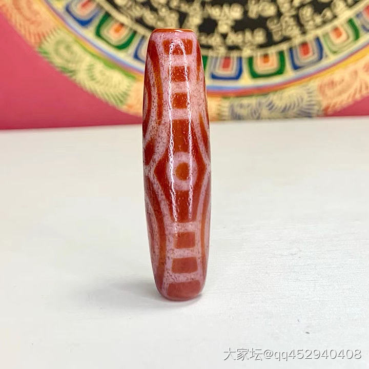 红肉龙六眼天珠_天珠