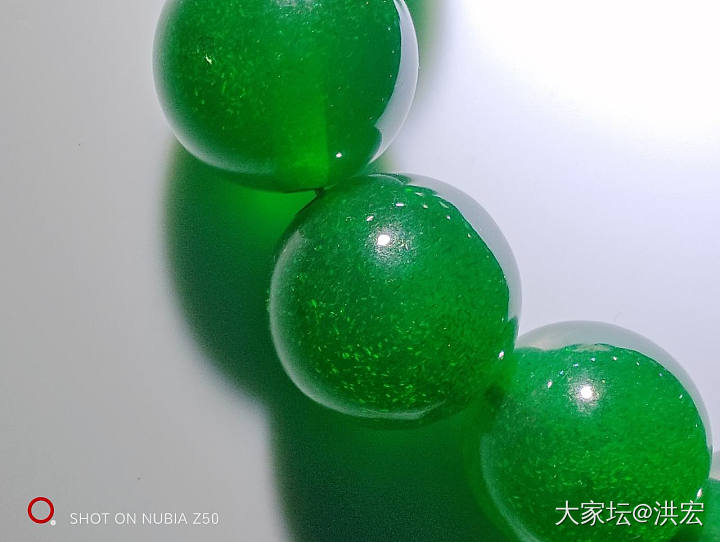 西亚蜜蜡之雪山蜜蜡暨金沙现象在鉴定中运用