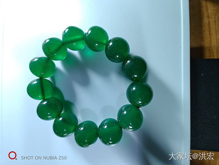 西亚蜜蜡之雪山蜜蜡暨金沙现象在鉴定中运用