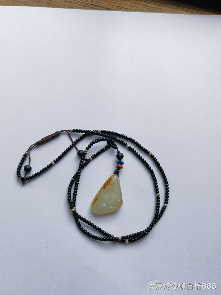 戴了一个冬天的小荷花_和田玉