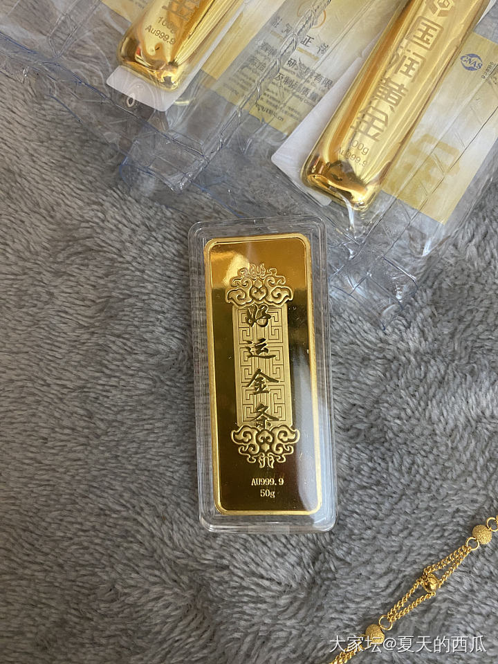 全新金条100g 50g
菜百元宝50g_金