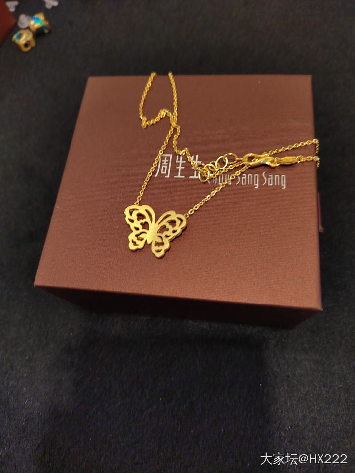 周生生剪纸蝴蝶和银杏_金