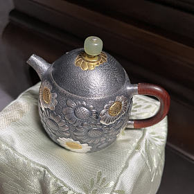 出个貌美银壶