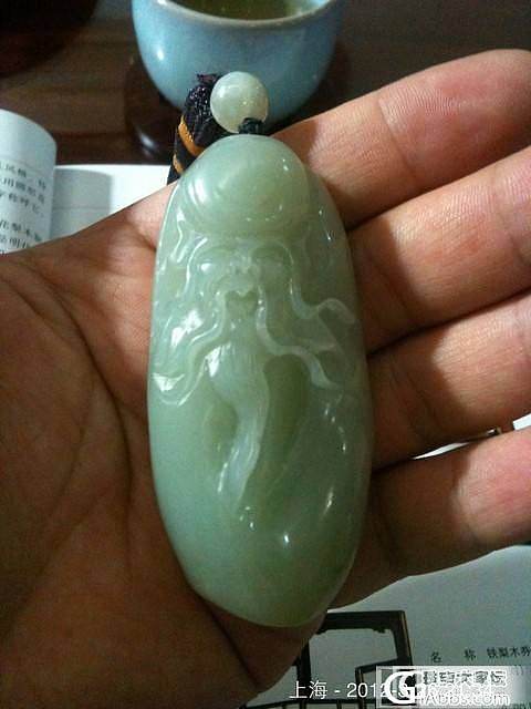 看书喝茶把玩的青白玉寿星公_和田玉