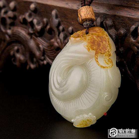 红皮籽料和田玉把件_和田玉